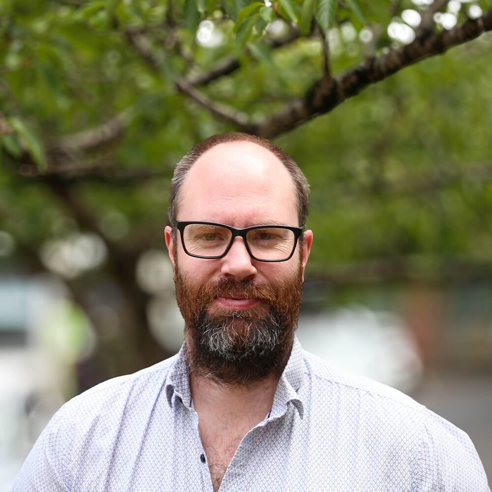 Portrait photo of Hamish Tucker